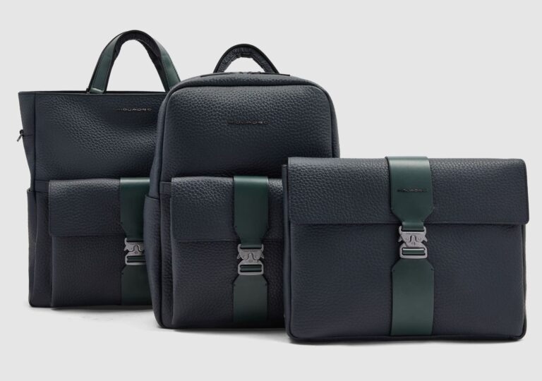 Borsa shopper e zaino della collezione Piquadro MATERIA in pelle blu, con la tasca frontale removibile in primo piano